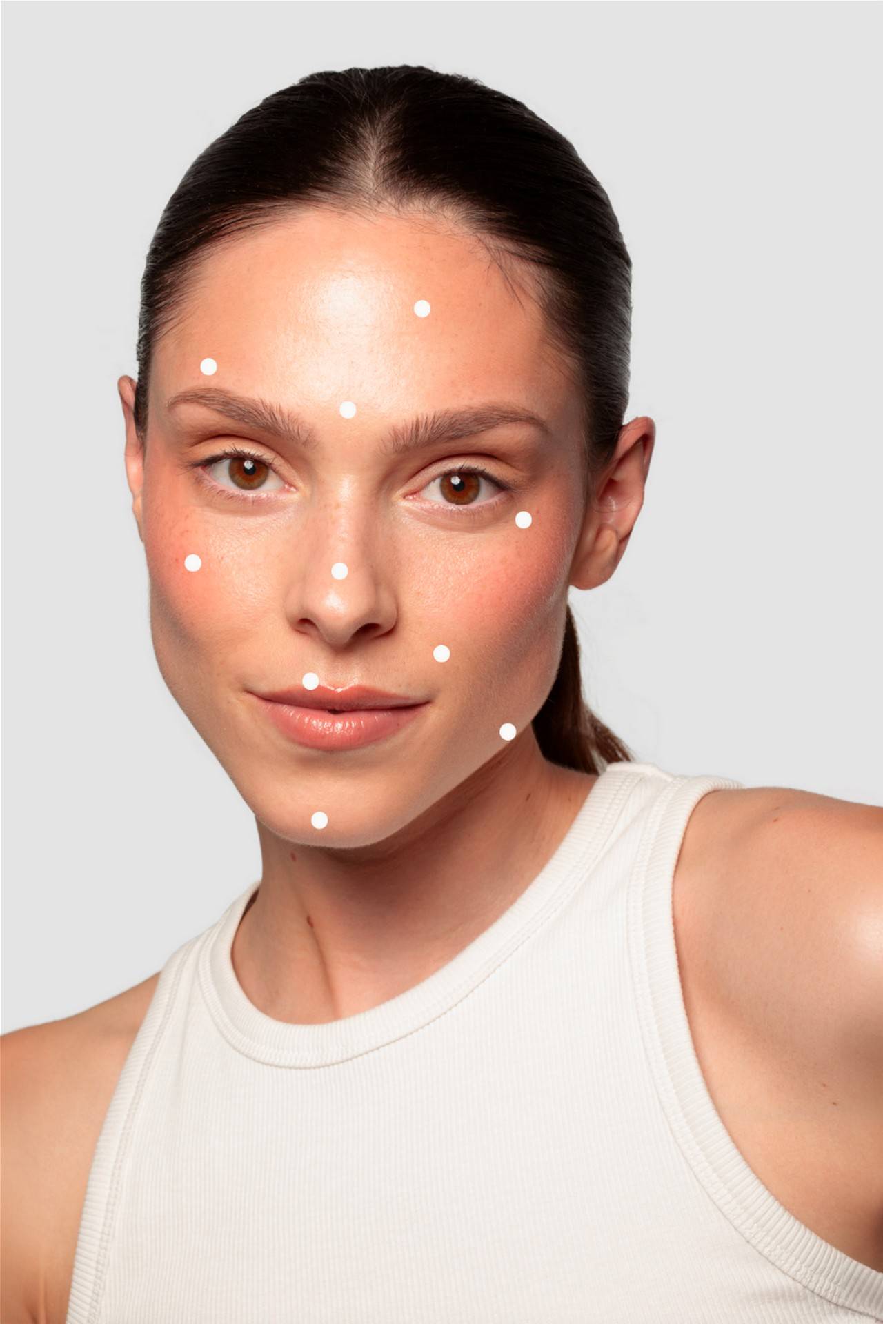 Repère sur le visage indiquant les différentes zones d’injection d’acide hyaluronique